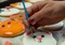 Decorating a cat cookie